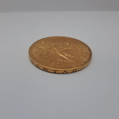 K1 41,60 GRMS - DTO. 0,00 GRMS - 21 K - AVALÚO 79372,80 * IDENTIFICACIÓN  MONEDA NOMINATIVA * MONEDAS PESOS  50 PESOS (SEMINUEVO)