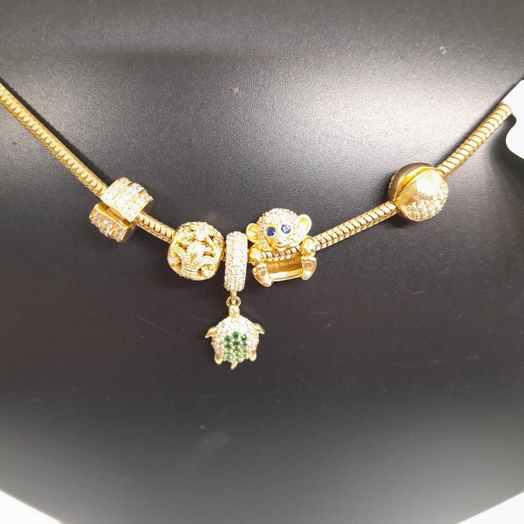 PULSERA CHARM ORO 14K 16.4 (NUEVO)