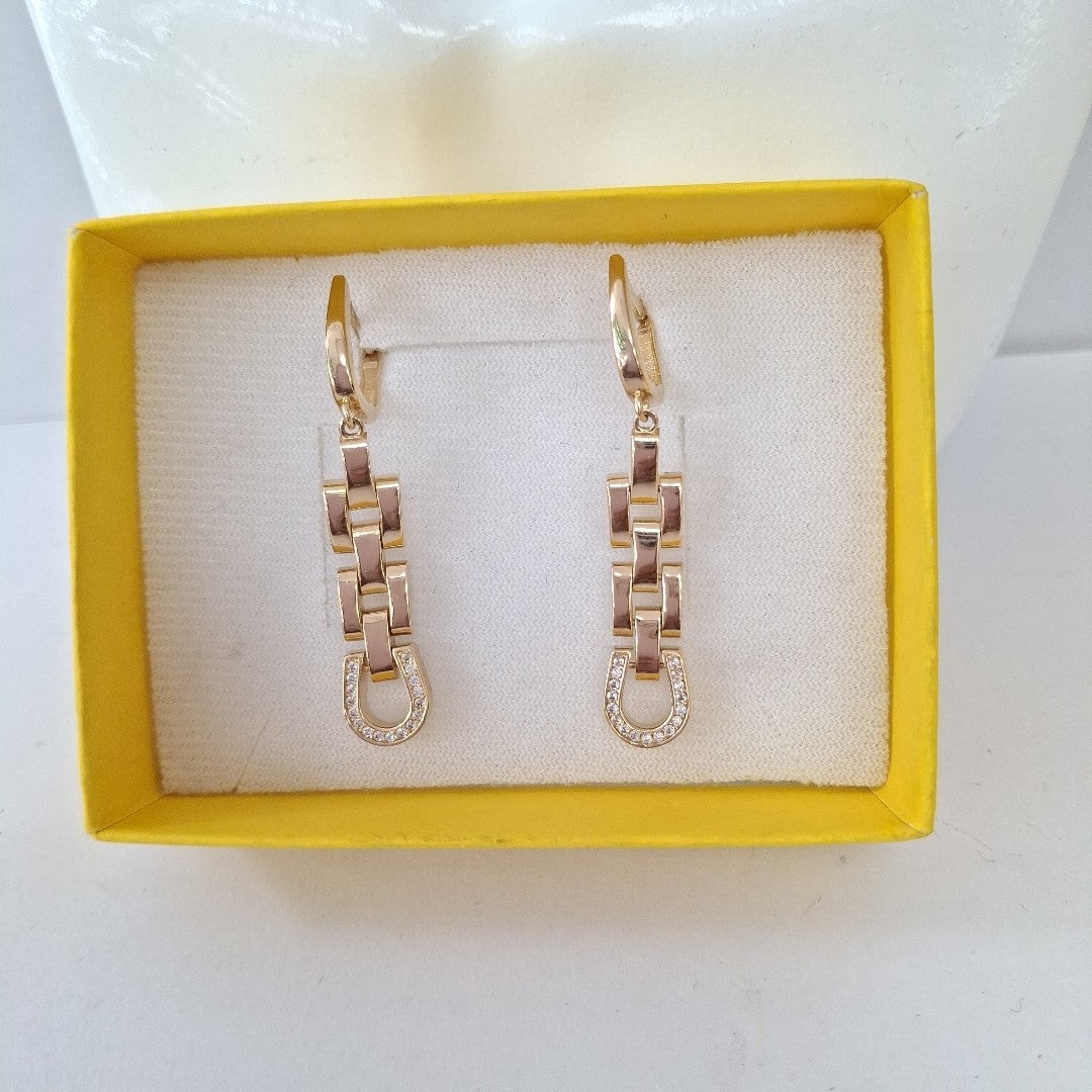 BROQUELES ORO 14K 7.1 (NUEVO)