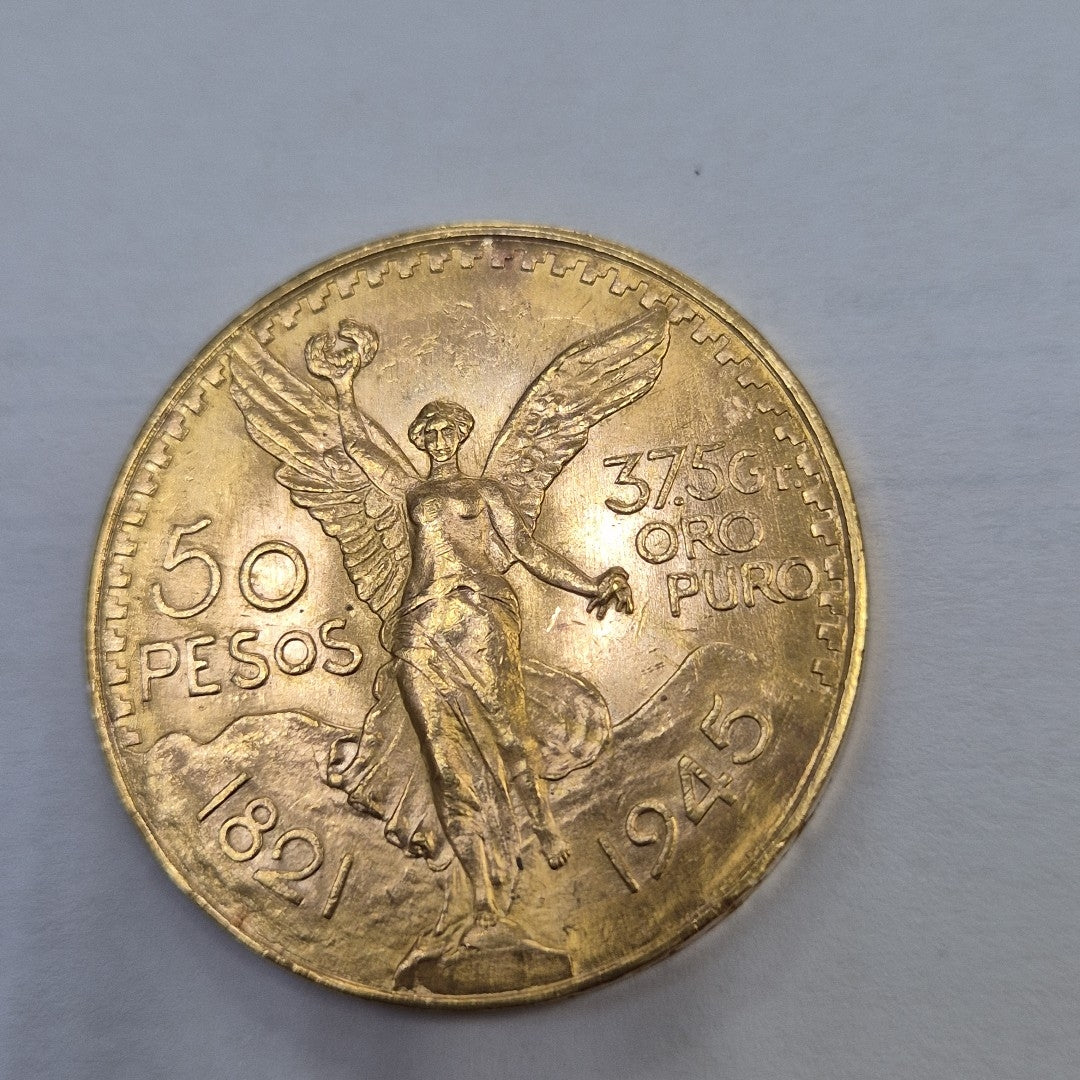 K1 41,60 GRMS - DTO. 0,00 GRMS - 21 K - AVALÚO 80870,40 * IDENTIFICACIÓN  MONEDA NOMINATIVA * MONEDAS PESOS  50 PESOS (SEMINUEVO)