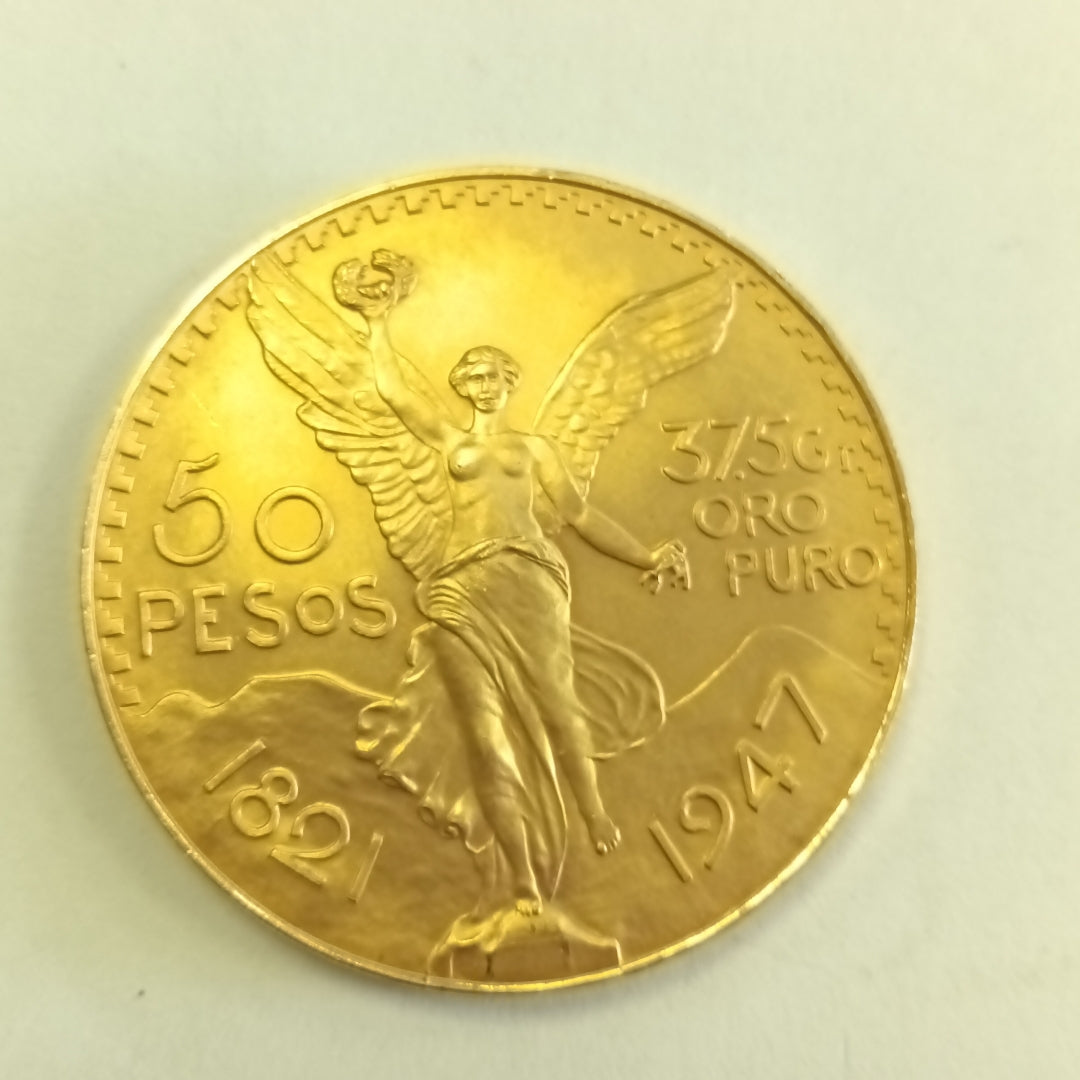 K1 41,60 GRMS - DTO. 0,00 GRMS - 21 K - AVALÚO 77126,40 * IDENTIFICACIÓN  MONEDA NOMINATIVA * MONEDAS PESOS  50 PESOS (SEMINUEVO)