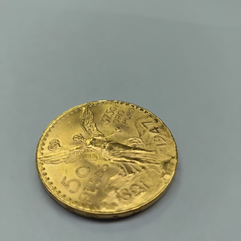 K1 41.6 GRMS - DESC.  0 GRAMOS - 21 K - AVALÚO  73008 * * IDENTIFICACIÓN  MONEDA NOMINATIVA. * MONEDAS PESOS  50 PESOS. (SEMINUEVO)