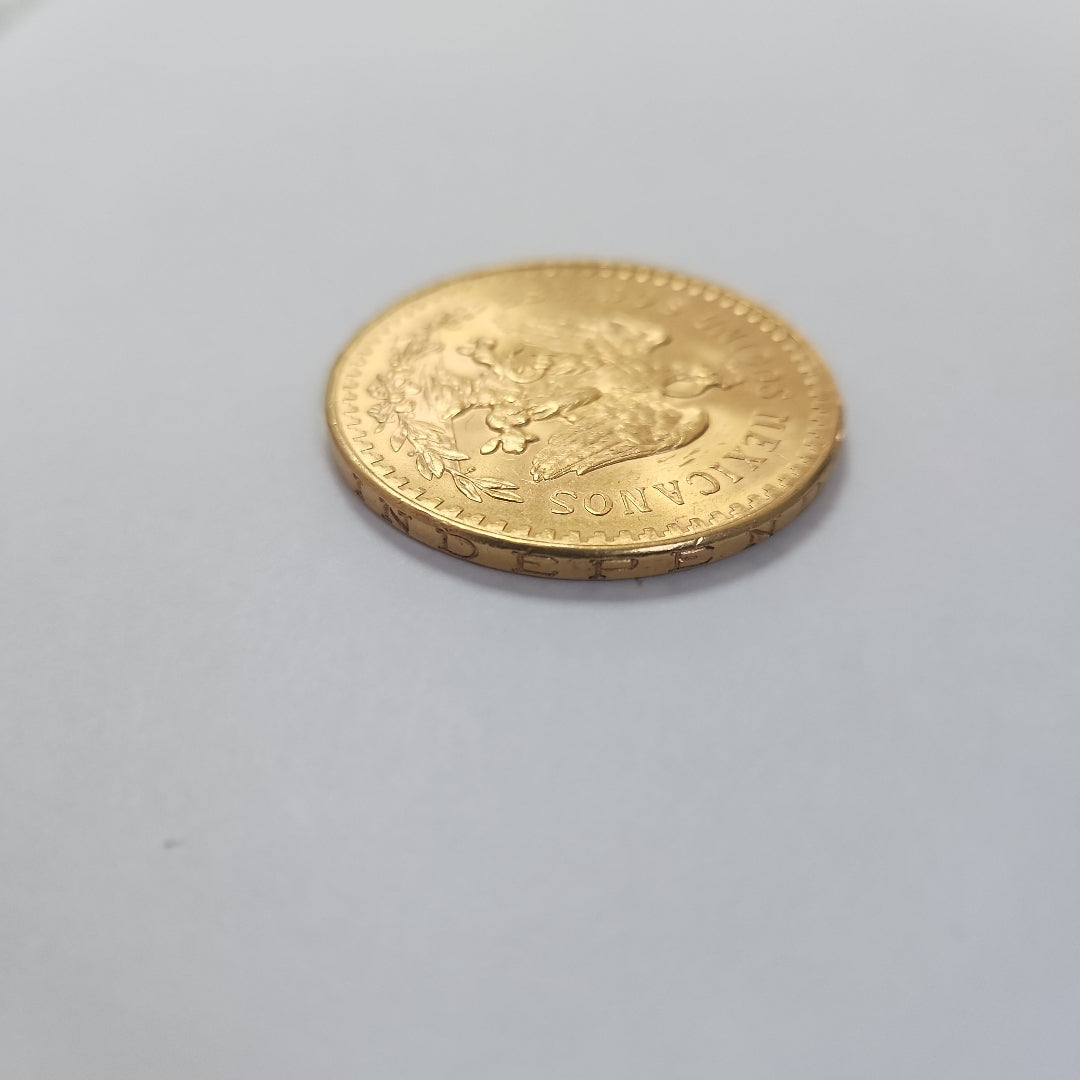 K1 41.6 GRMS - DESC.  0 GRAMOS - 21 K - AVALÚO  77688 * * IDENTIFICACIÓN  MONEDA NOMINATIVA. * MATERIALES  ORO. * CANTI (SEMINUEVO)
