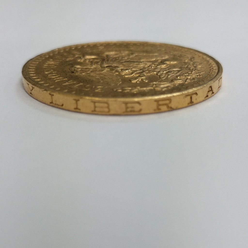 K1 41.6 GRMS - DESC.  0 GRAMOS - 21 K - AVALÚO  71884.8 * * IDENTIFICACIÓN  MONEDA NOMINATIVA. * MONEDAS PESOS  50 PESO (SEMINUEVO)