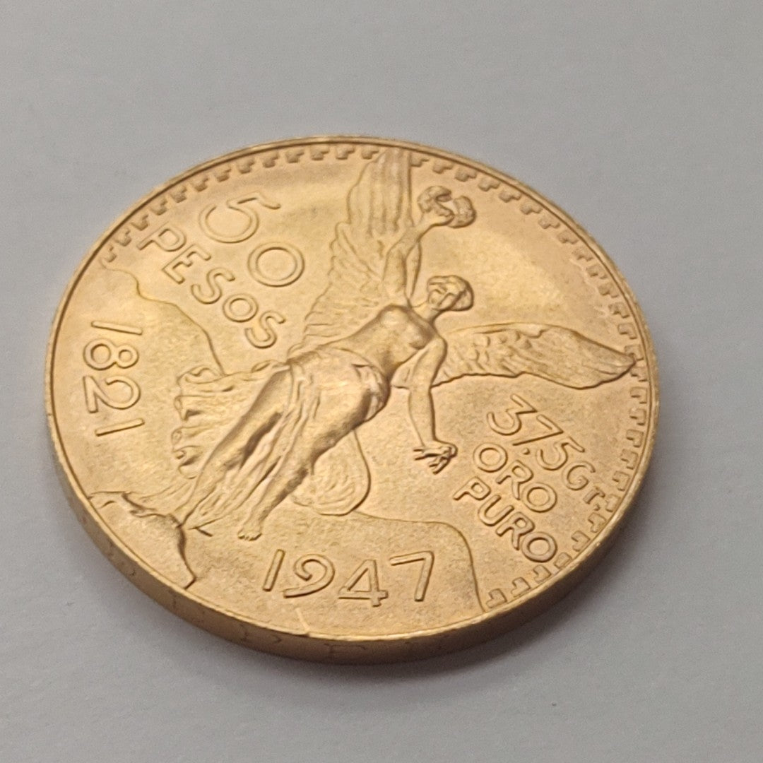 K1 41.6 GRMS - DESC.  0 GRAMOS - 21 K - AVALÚO  71884.8 * * IDENTIFICACIÓN  MONEDA NOMINATIVA. * MONEDAS PESOS  50 PESO (SEMINUEVO)