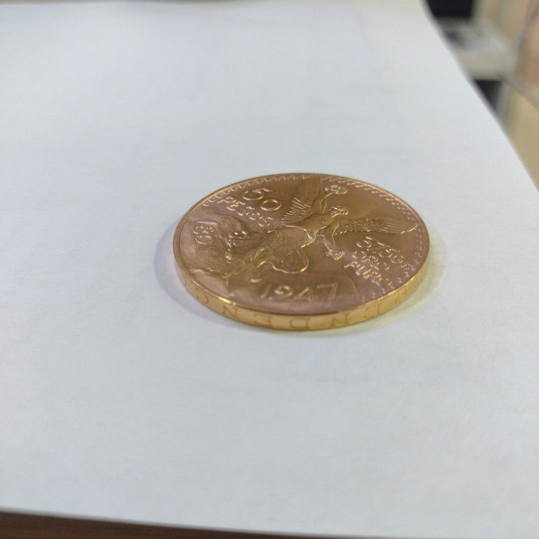 K1 41,60 GRMS - DTO. 0,00 GRMS - 21 K - AVALÚO 77126,40 * IDENTIFICACIÓN  MONEDA NOMINATIVA * MATERIALES  ORO * ESPECI (SEMINUEVO)