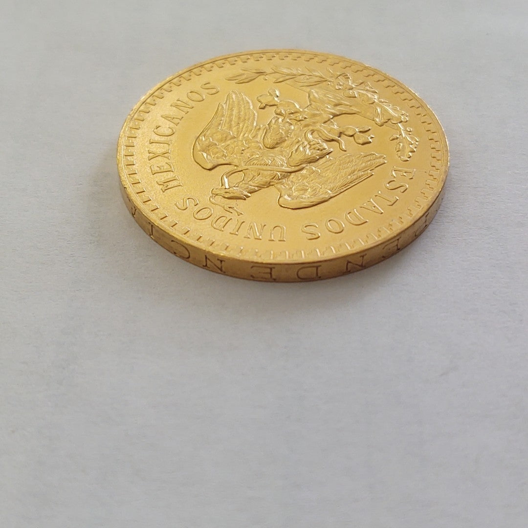K1 41,60 GRMS - DTO. 0,00 GRMS - 21 K - AVALÚO 80496,00 * IDENTIFICACIÓN  MONEDA NOMINATIVA * MONEDAS PESOS  50 PESOS (SEMINUEVO)