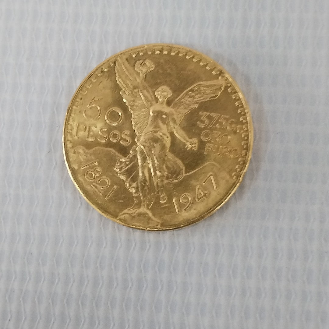 K1 41,60 GRMS - DTO. 0,00 GRMS - 21 K - AVALÚO 76003,20 * IDENTIFICACIÓN  MONEDA NOMINATIVA * MONEDAS PESOS  50 PESOS (SEMINUEVO)