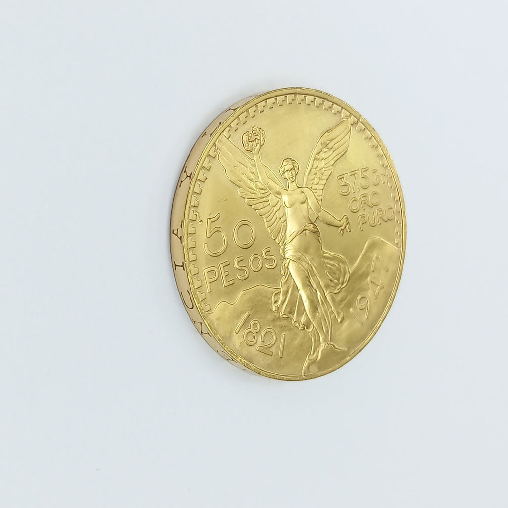 K1 41.6 GRMS - DESC.  0 GRAMOS - 21 K - AVALÚO  69638.4 * * IDENTIFICACIÓN  MONEDA NOMINATIVA. * MONEDAS PESOS  50 PESO (SEMINUEVO)