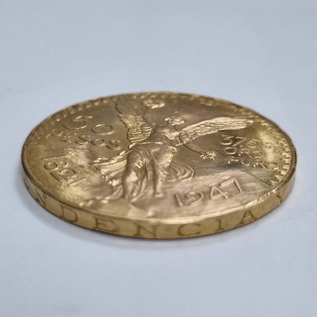 K1 41,60 GRMS - DTO. 0,00 GRMS - 21 K - AVALÚO 76003,20 * IDENTIFICACIÓN  MONEDA NOMINATIVA * MONEDAS PESOS  50 PESOS (SEMINUEVO)