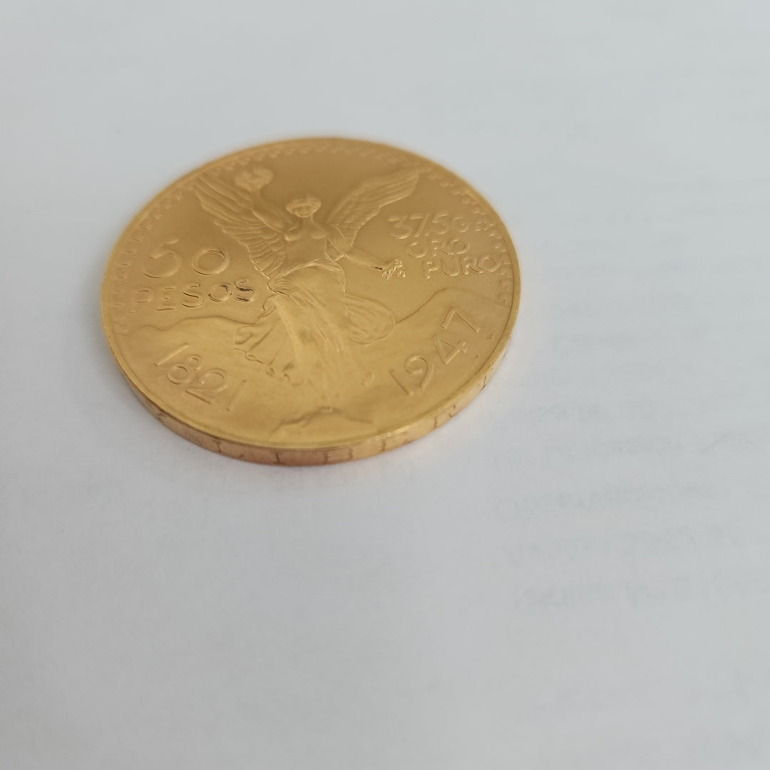 K1 41.6 GRMS - DESC.  0 GRAMOS - 21 K - AVALÚO  75254.4 * * IDENTIFICACIÓN  MONEDA NOMINATIVA. * MONEDAS PESOS  50 PESO (SEMINUEVO)