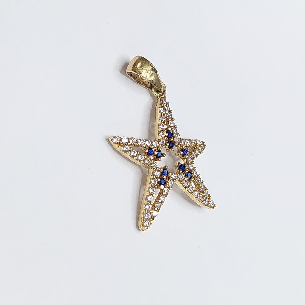 10297DIJ00000B363 FRD5 DIJE ESTRELLA DE MAR CON CIRCONIAS BLANCAS Y AZULES ORO 14K 1.5GRS (NUEVO)