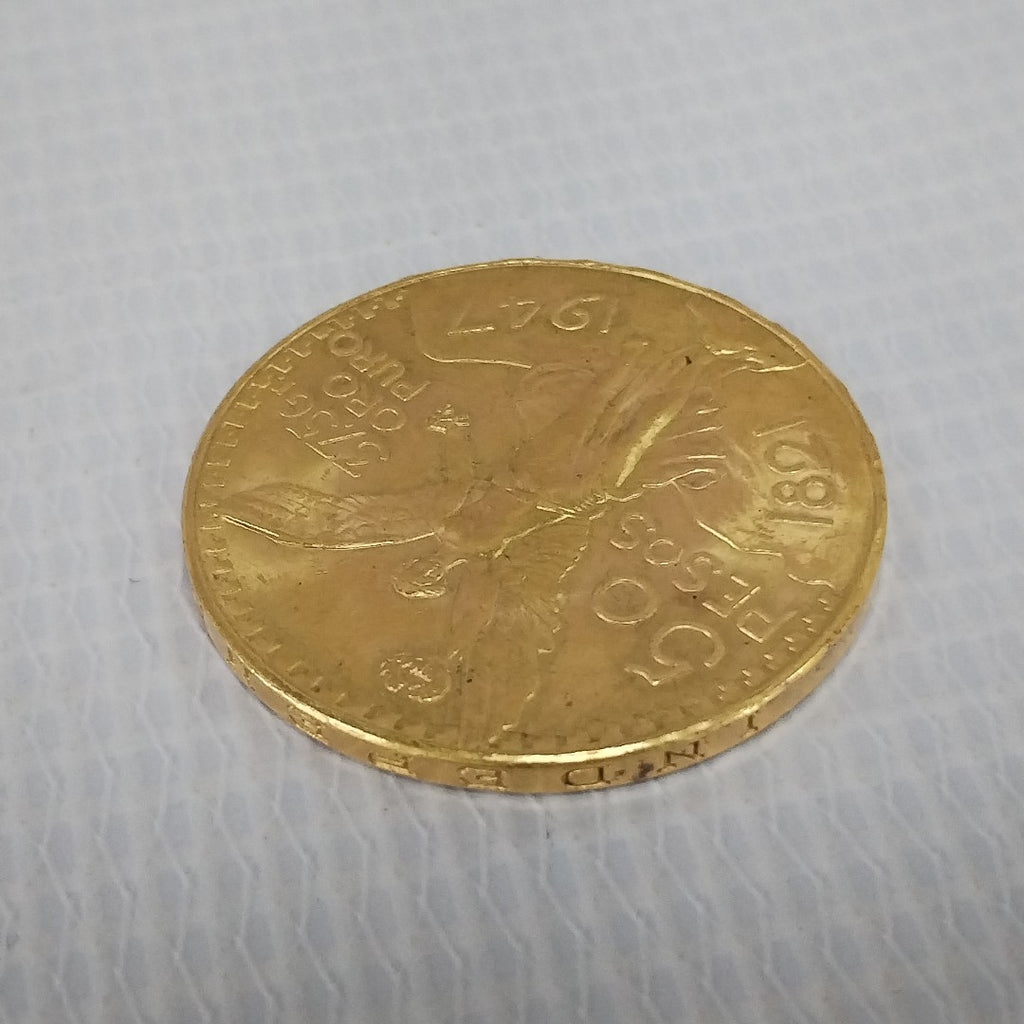 K1 41,60 GRMS - DTO. 0,00 GRMS - 21 K - AVALÚO 76003,20 * IDENTIFICACIÓN MONEDA NOMINATIVA * MONEDAS PESOS 50 PESOS (SEMINUEVO)