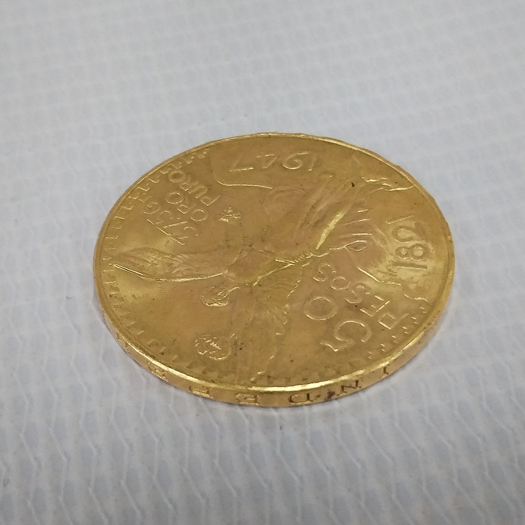 K1 41,60 GRMS - DTO. 0,00 GRMS - 21 K - AVALÚO 76003,20 * IDENTIFICACIÓN MONEDA NOMINATIVA * MONEDAS PESOS 50 PESOS (SEMINUEVO)