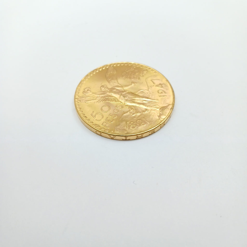 K1 41.6 GRMS - DESC. 0 GRAMOS - 21 K - AVALÚO 74131.2 * * IDENTIFICACIÓN MONEDA NOMINATIVA. * MONEDAS PESOS 50 PESO (SEMINUEVO)