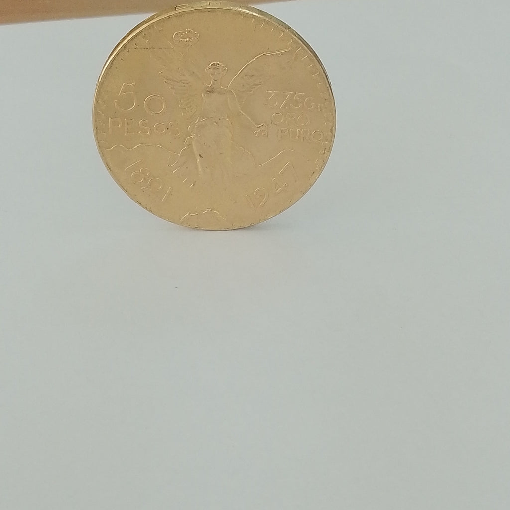 K1 41,60 GRMS - DTO. 0,00 GRMS - 21 K - AVALÚO 77126,40 * IDENTIFICACIÓN MONEDA NOMINATIVA * MONEDAS PESOS 50 PESOS (SEMINUEVO)