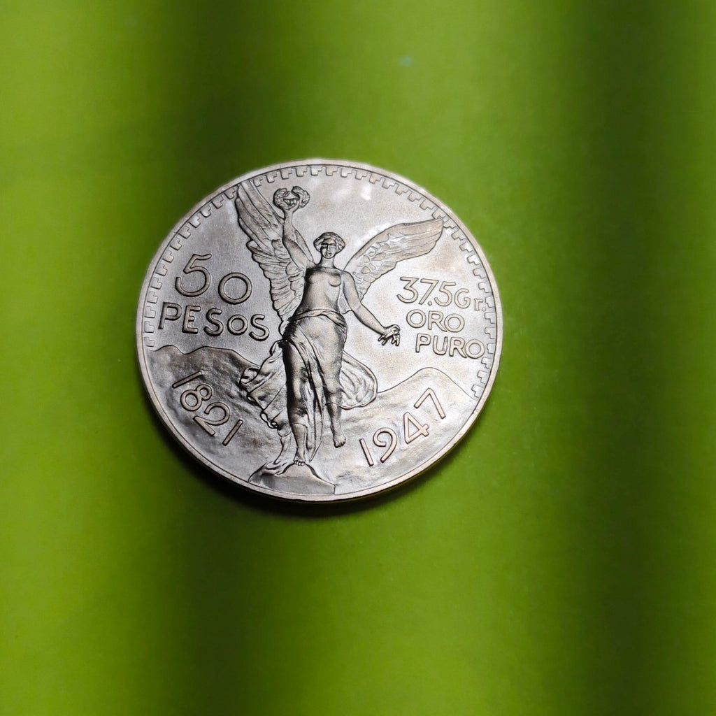K1 41,60 GRMS - DTO. 0,00 GRMS - 21 K - AVALÚO 76003,20 * IDENTIFICACIÓN MONEDA NOMINATIVA * MONEDAS PESOS 50 PESOS (SEMINUEVO)