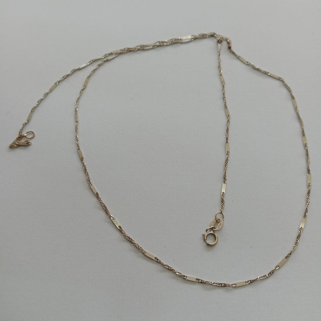 CADENA. ORO BLANCO. 14 K 2.1 GRMS (SEMINUEVO)
