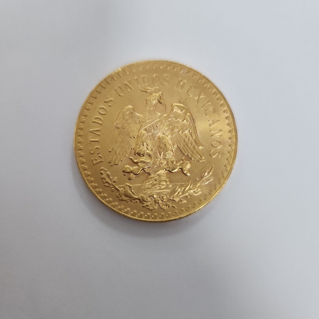 K1 41.6 GRMS - DESC. 0 GRAMOS - 21 K - AVALÚO 80496 * * IDENTIFICACIÓN MONEDA NOMINATIVA. * MONEDAS PESOS 50 PESOS. (SEMINUEVO)