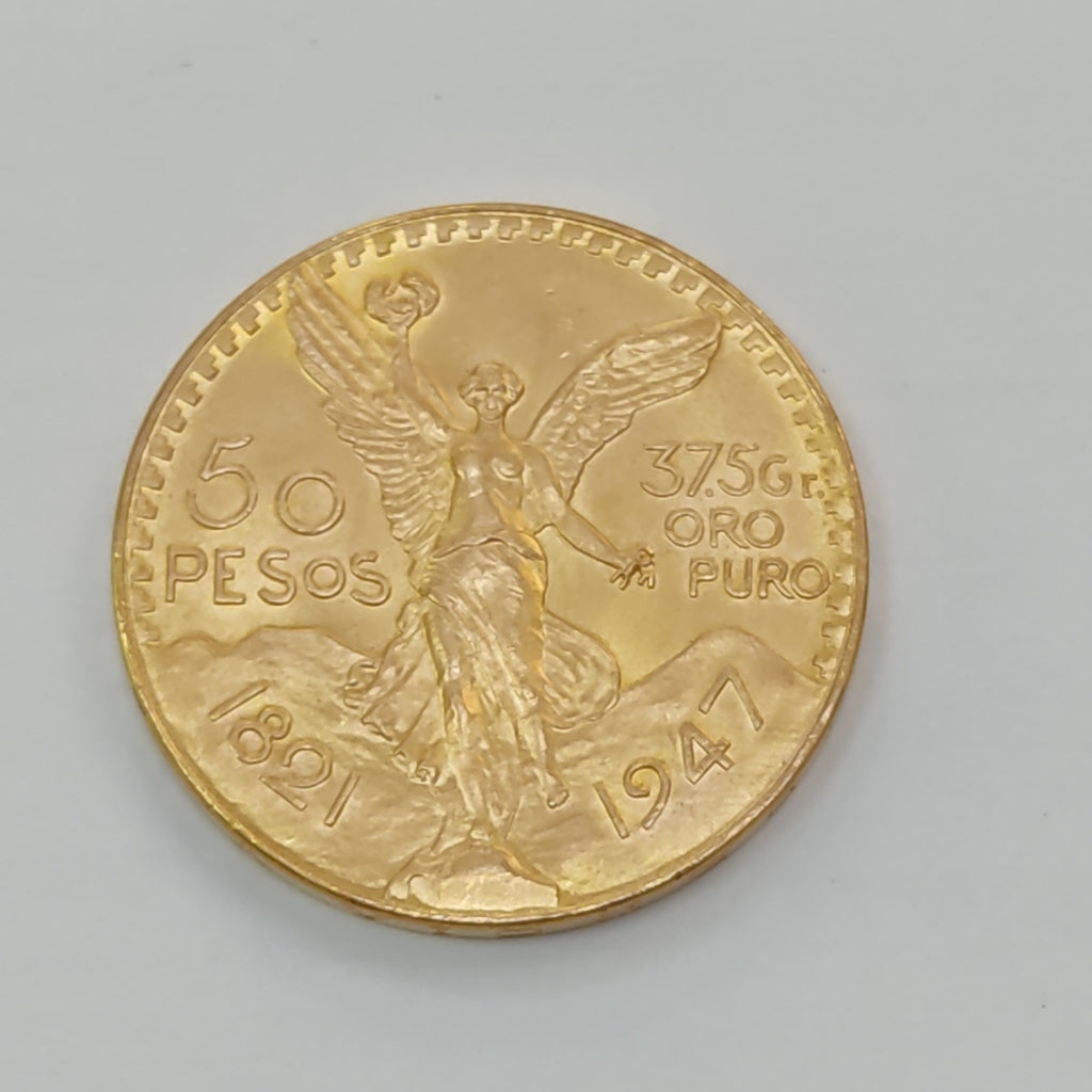 K1 41,60 GRMS - DTO. 0,00 GRMS - 21 K - AVALÚO 77126,40 * IDENTIFICACIÓN MONEDA NOMINATIVA * MONEDAS PESOS 50 PESOS (SEMINUEVO)
