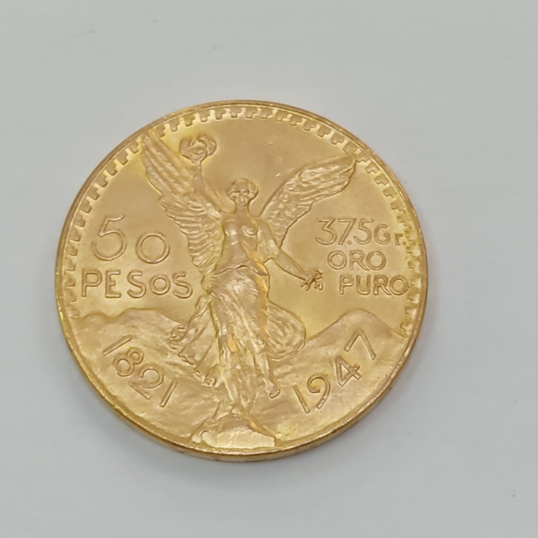 K1 41,60 GRMS - DTO. 0,00 GRMS - 21 K - AVALÚO 77126,40 * IDENTIFICACIÓN MONEDA NOMINATIVA * MONEDAS PESOS 50 PESOS (SEMINUEVO)