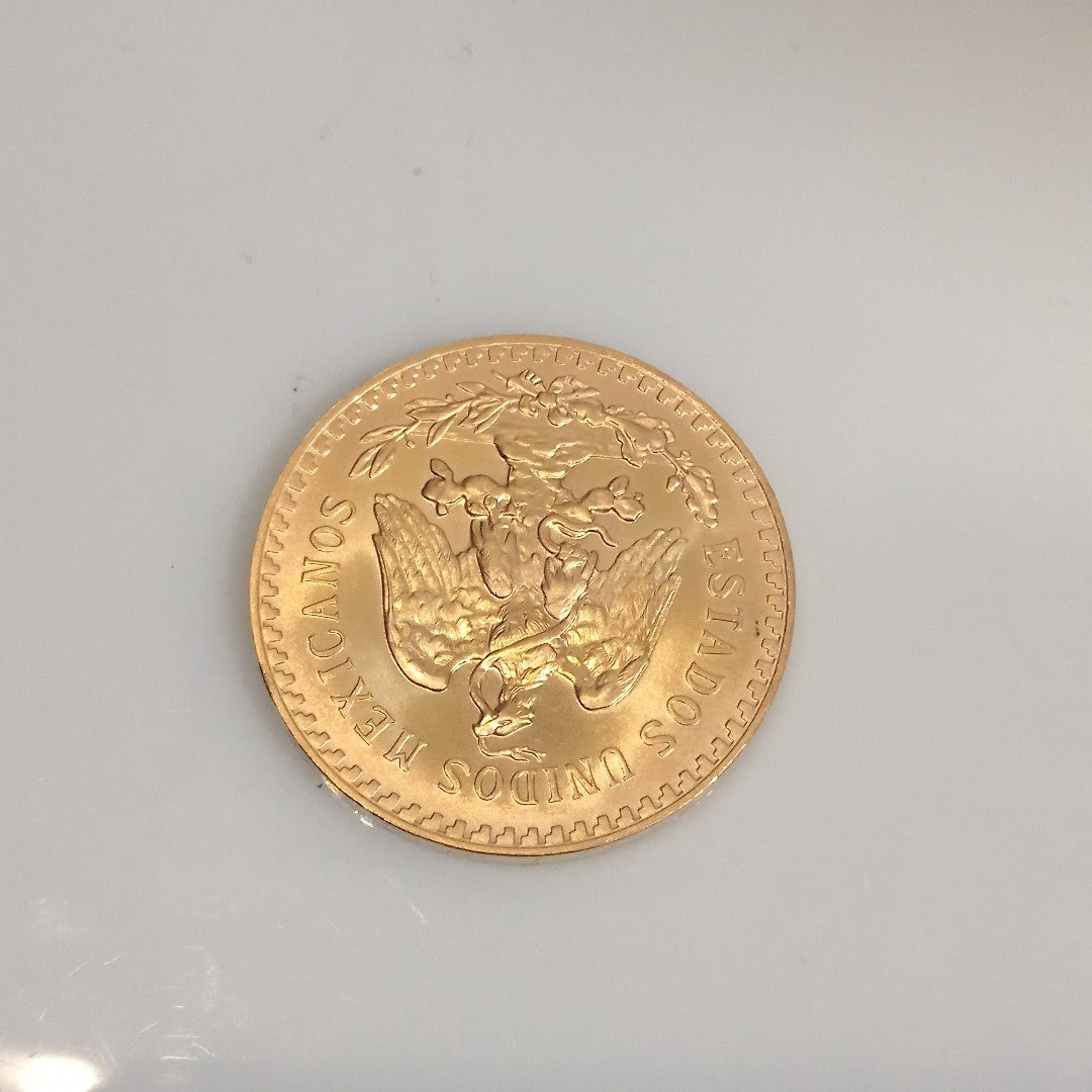 K1 41.6 GRMS - DESC. 0 GRAMOS - 21 K - AVALÚO 77126.4 * * IDENTIFICACIÓN MONEDA NOMINATIVA. * MONEDAS PESOS 50 PESO (SEMINUEVO)