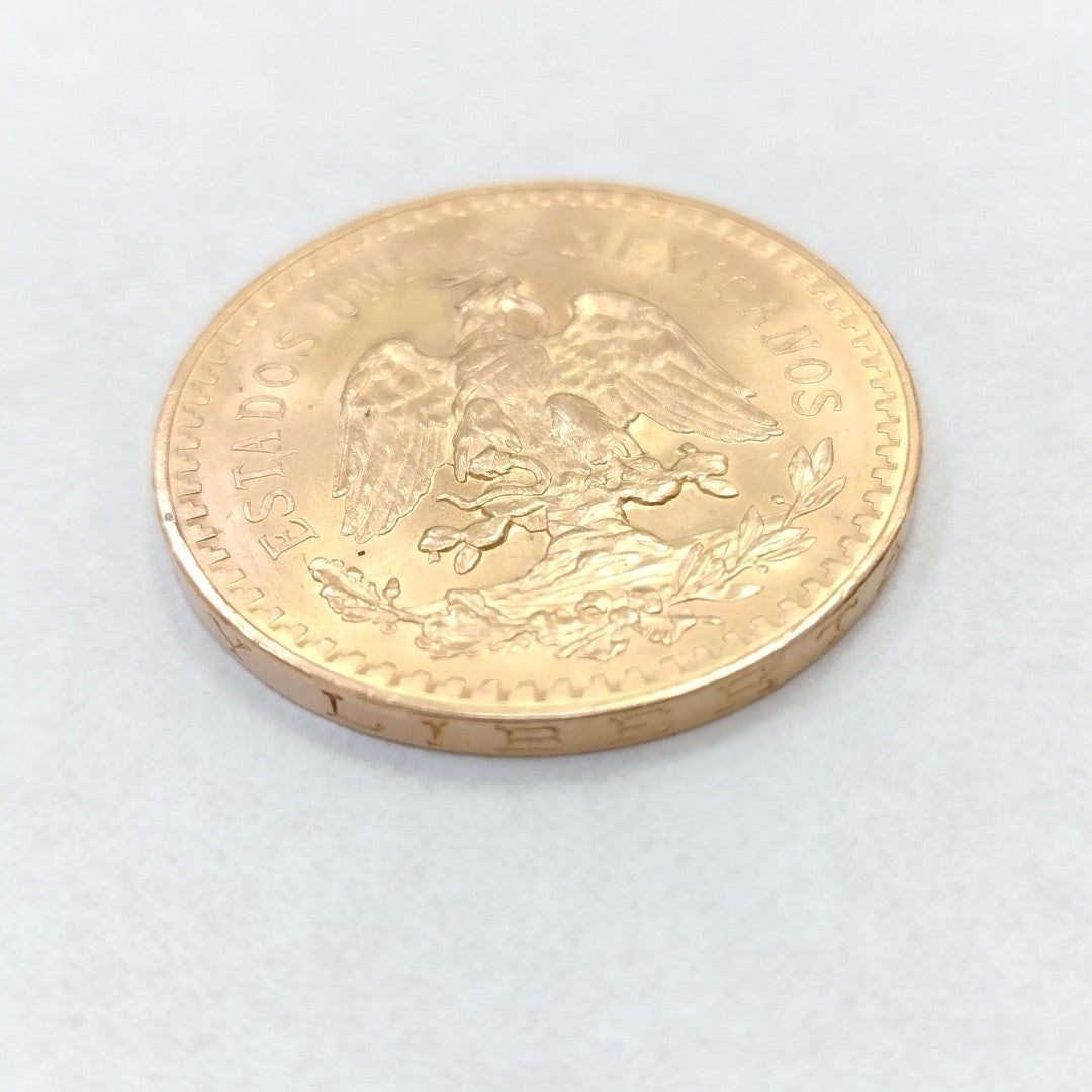 K1 41.6 GRMS - DESC. 0 GRAMOS - 21 K - AVALÚO 76377.6 * * IDENTIFICACIÓN MONEDA NOMINATIVA. * MONEDAS PESOS 50 PESO (SEMINUEVO)