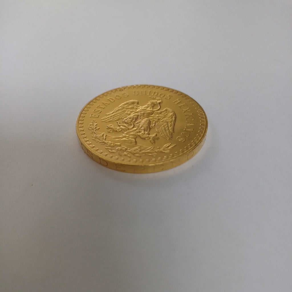 K1 41.6 GRMS - DESC. 0 GRAMOS - 21 K - AVALÚO 71884.8 * * IDENTIFICACIÓN MONEDA NOMINATIVA. * MONEDAS PESOS 50 PESO (SEMINUEVO)