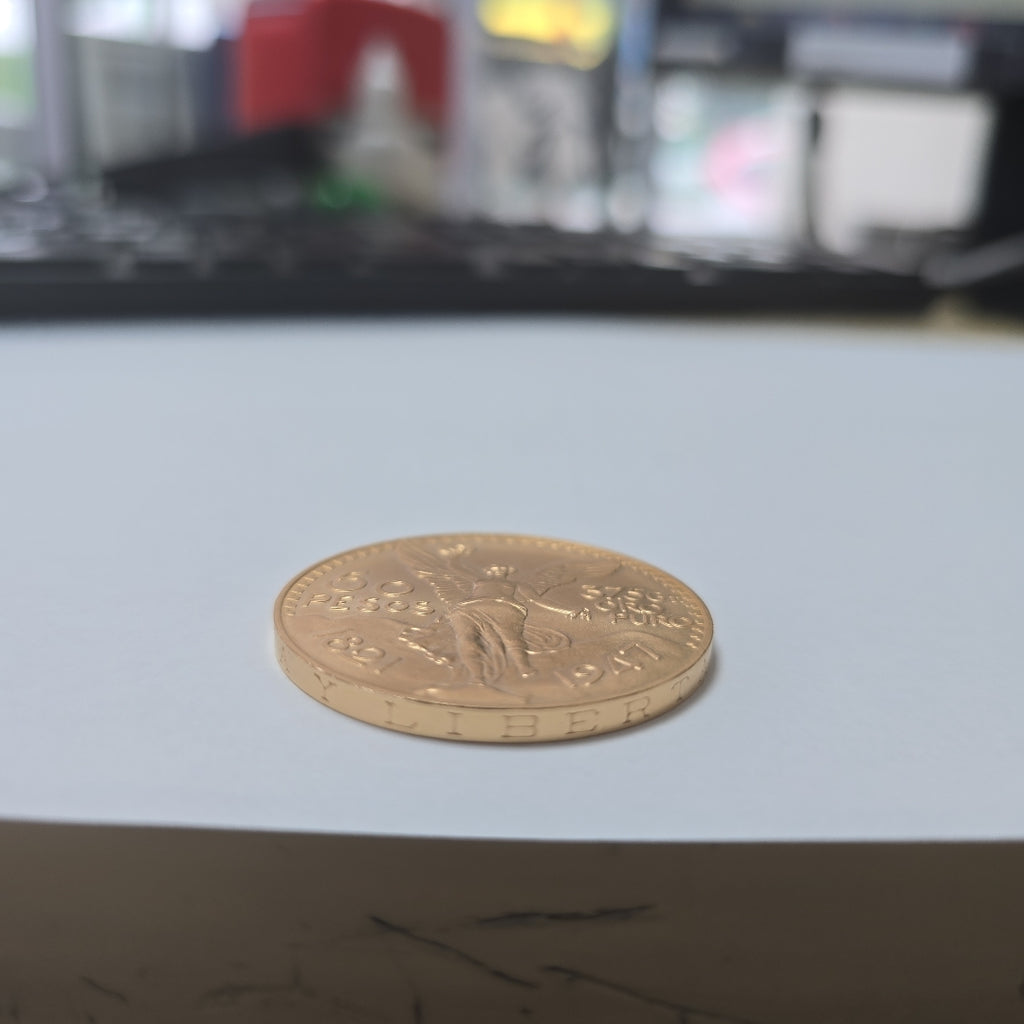 K1 41,60 GRMS - DTO. 0,00 GRMS - 21 K - AVALÚO 78260,00 * IDENTIFICACIÓN MONEDA NOMINATIVA * MONEDAS PESOS 50 PESOS (SEMINUEVO)