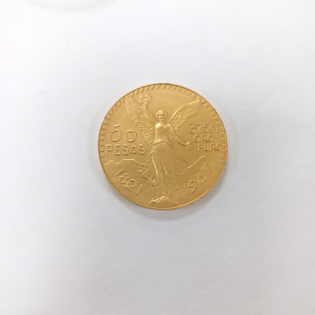 K1 41.6 GRMS - DESC. 0 GRAMOS - 21 K - AVALÚO 71884.8 * * IDENTIFICACIÓN MONEDA NOMINATIVA. * MONEDAS PESOS 50 PESO (SEMINUEVO)