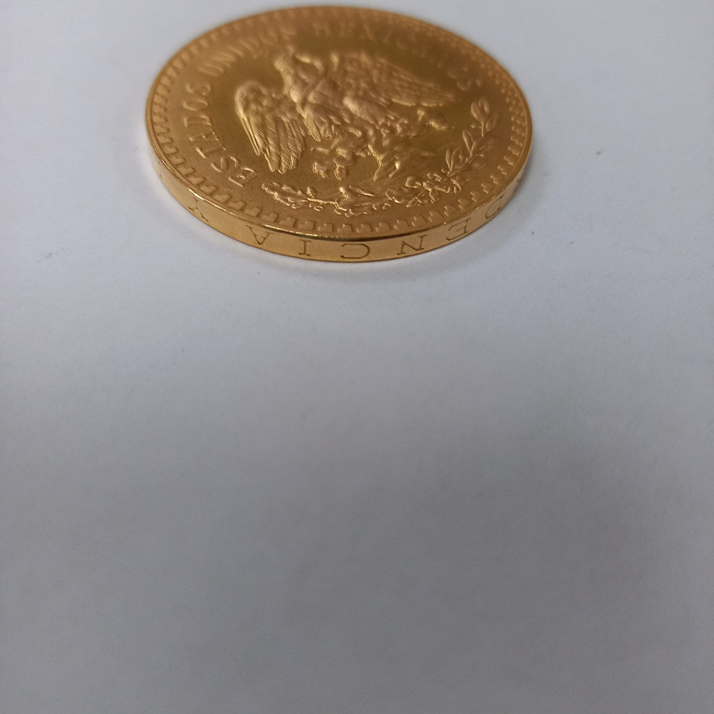 K1 41.6 GRMS - DESC. 0 GRAMOS - 21 K - AVALÚO 71884.8 * * IDENTIFICACIÓN MONEDA NOMINATIVA. * MONEDAS PESOS 50 PESO (SEMINUEVO)