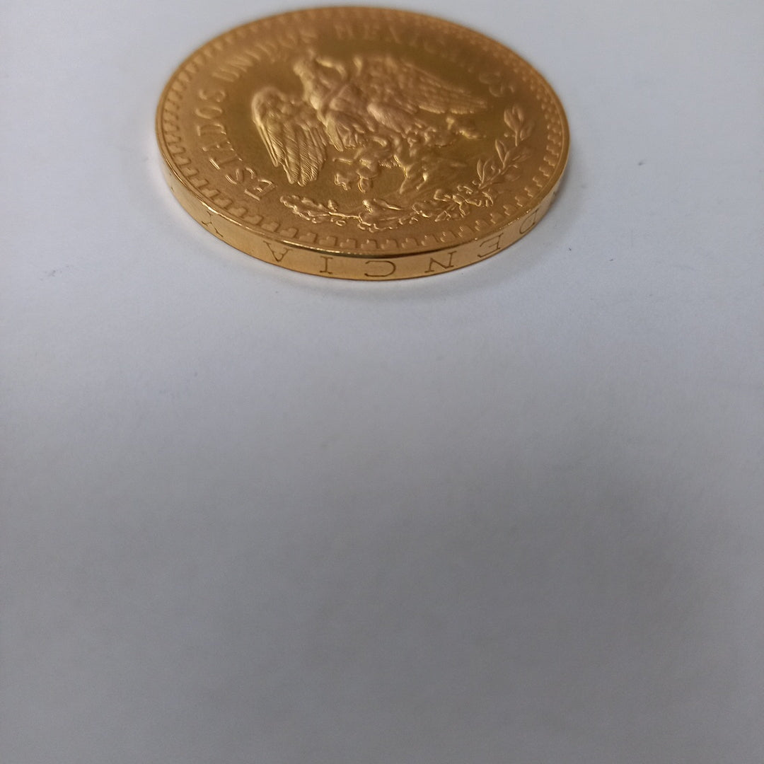 K1 41.6 GRMS - DESC. 0 GRAMOS - 21 K - AVALÚO 71884.8 * * IDENTIFICACIÓN MONEDA NOMINATIVA. * MONEDAS PESOS 50 PESO (SEMINUEVO)