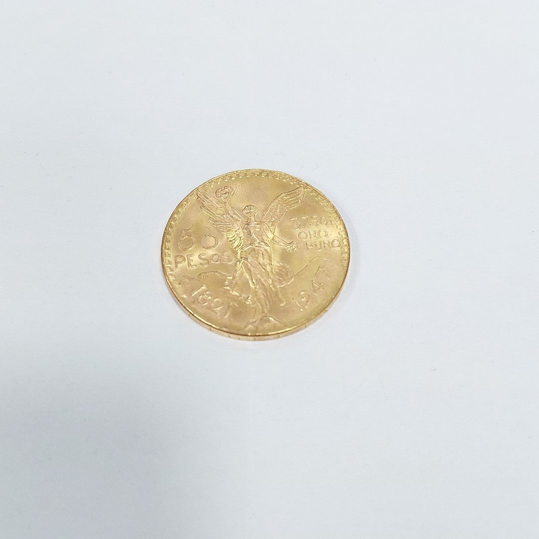 K1 41.6 GRMS - DESC. 0 GRAMOS - 21 K - AVALÚO 77126.4 * * IDENTIFICACIÓN MONEDA NOMINATIVA. * MONEDAS PESOS 50 PESO (SEMINUEVO)