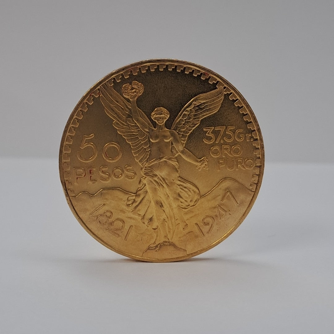 K1 41,60 GRMS - DTO. 0,00 GRMS - 21 K - AVALÚO 79534,21 * IDENTIFICACIÓN MONEDA NOMINATIVA * MONEDAS PESOS 50 PESOS (SEMINUEVO)