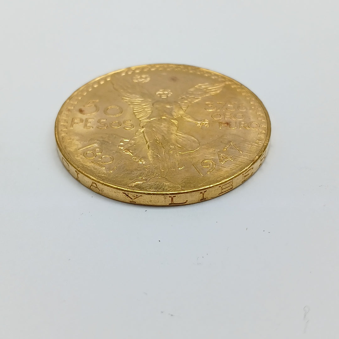 K1 41,60 GRMS - DTO. 0,00 GRMS - 21 K - AVALÚO 77126,40 * IDENTIFICACIÓN MONEDA NOMINATIVA * MONEDAS PESOS 50 PESOS (SEMINUEVO)