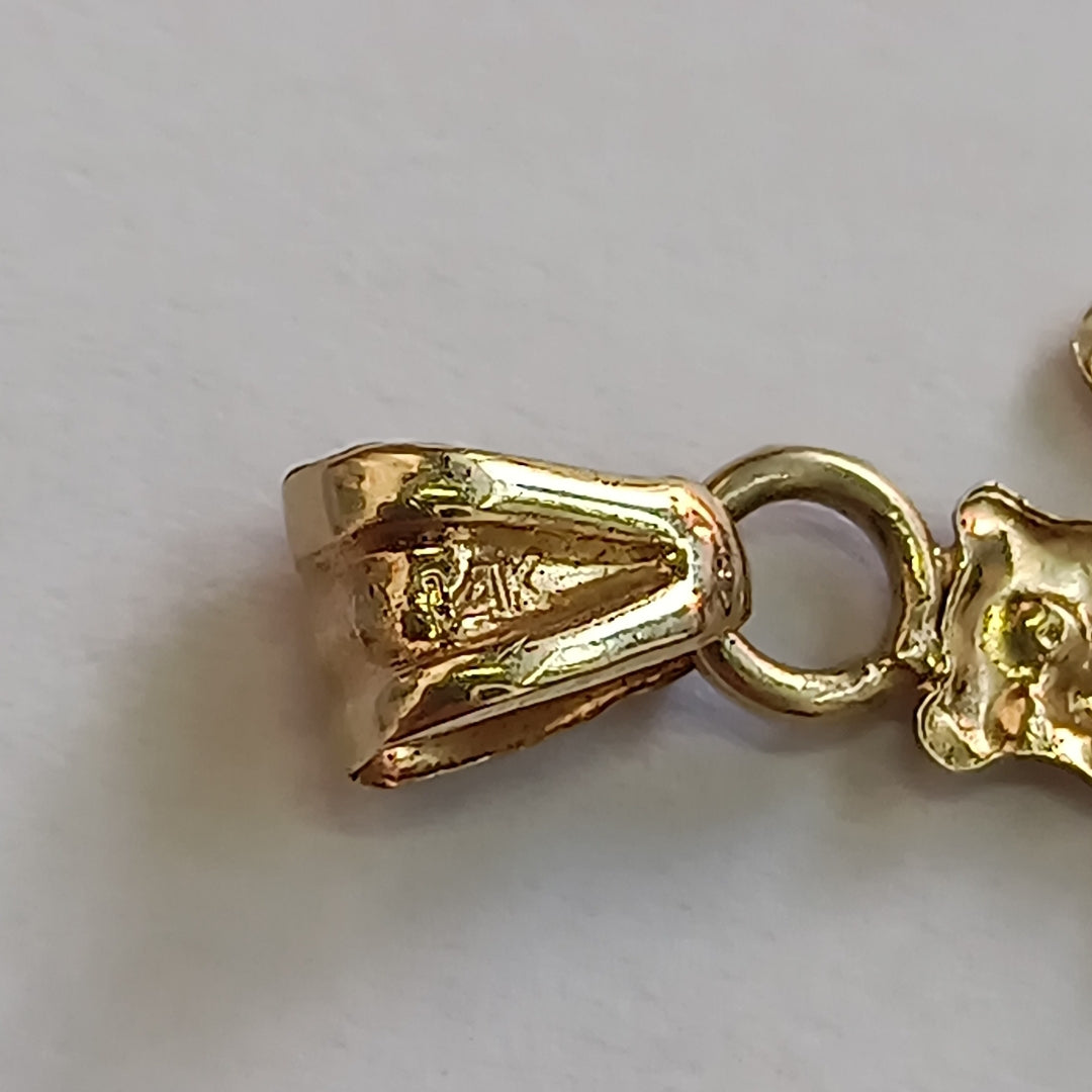 DIJE. ORO. 14 K 0.5 GRMS (SEMINUEVO)