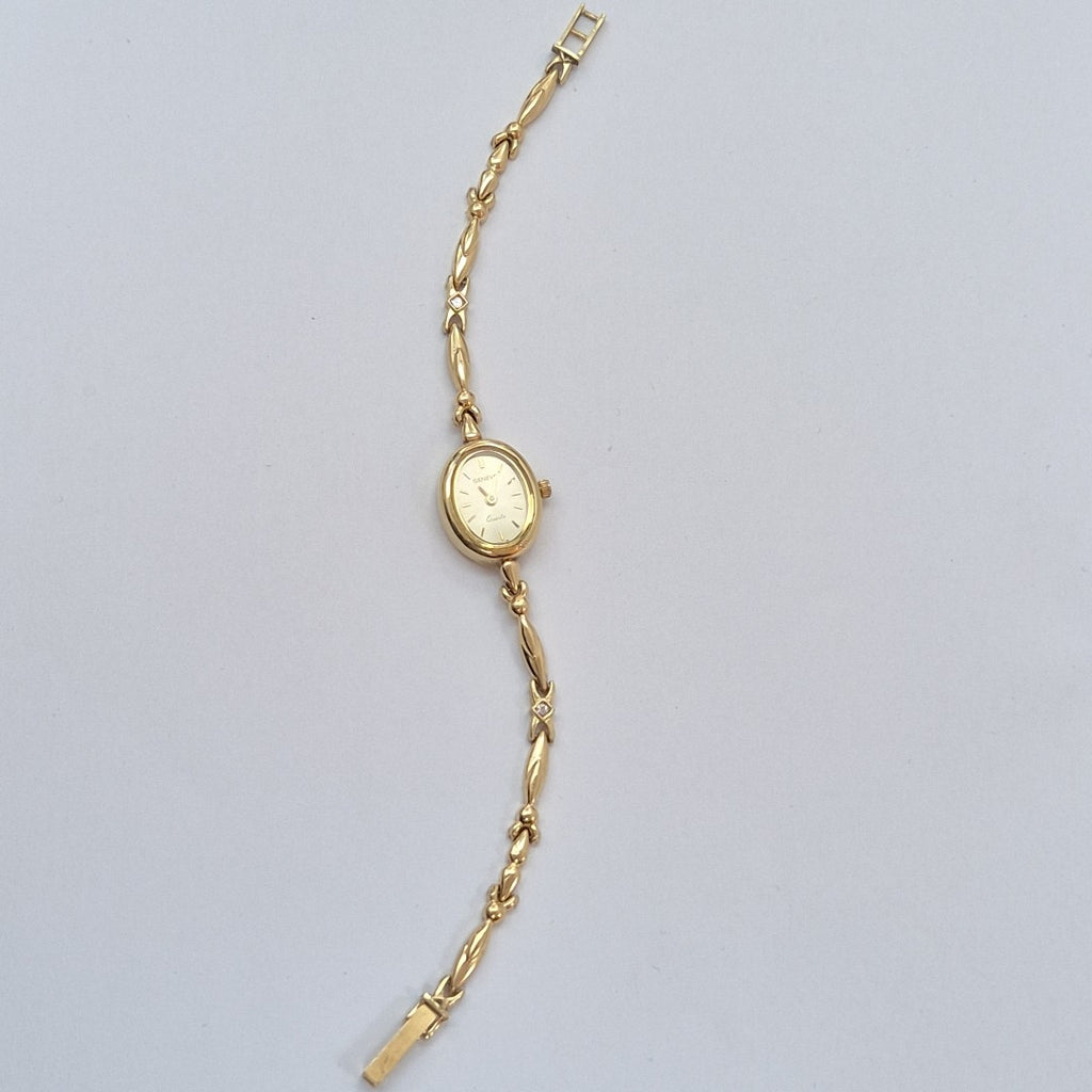 RELOJ CAJA Y PULSO ORO. ORO. 14 K 13.9 GRMS (SEMINUEVO)