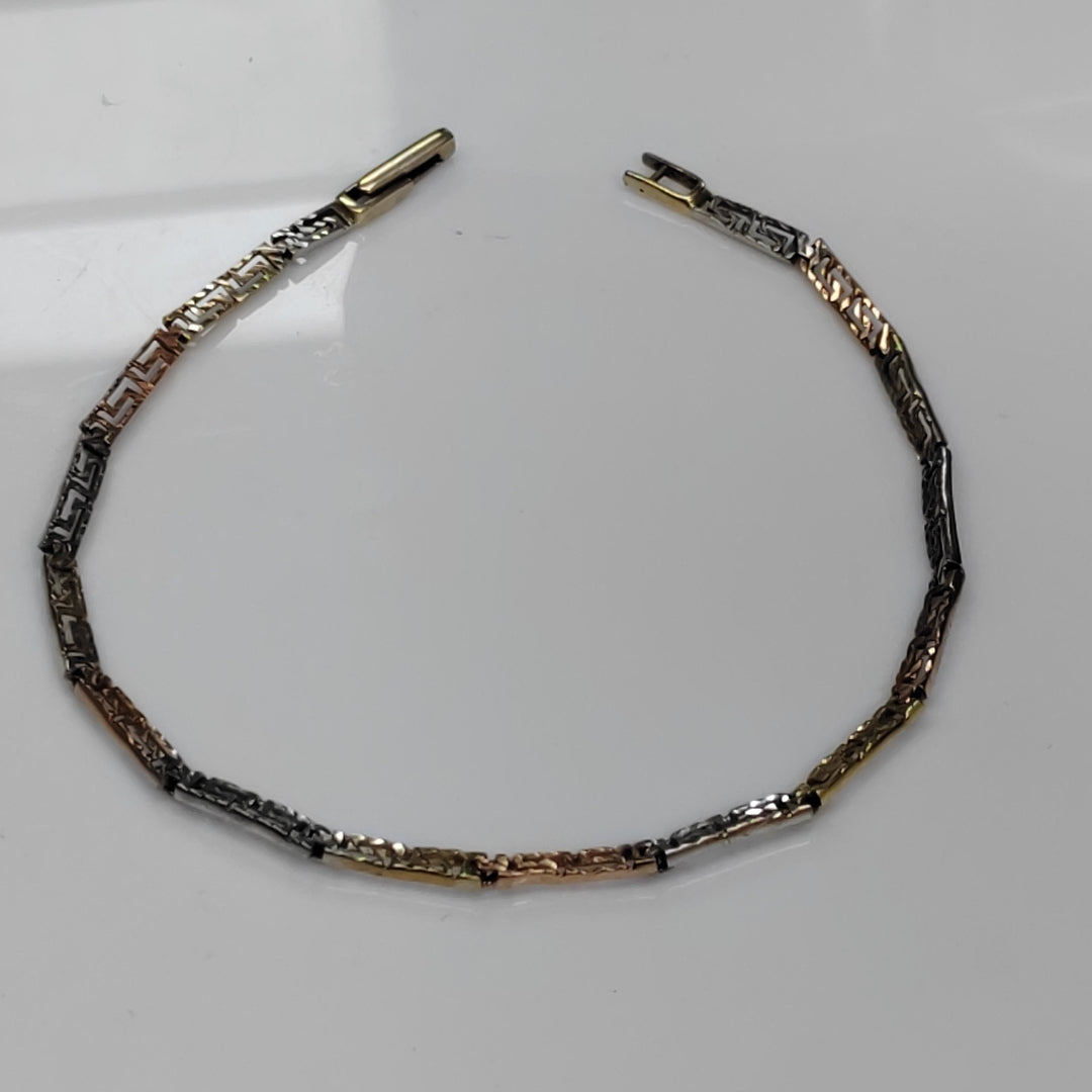 PULSERA. ORO COMBINADO. 14 K 3.7 GRMS (SEMINUEVO)