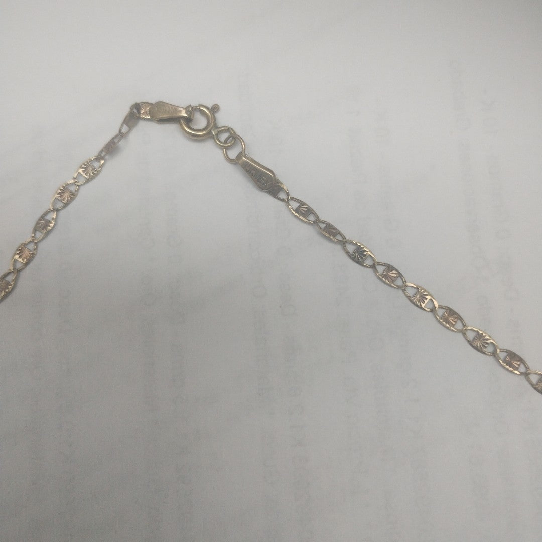 CADENA. ORO COMBINADO. 10 K 2.8 GRMS (SEMINUEVO)