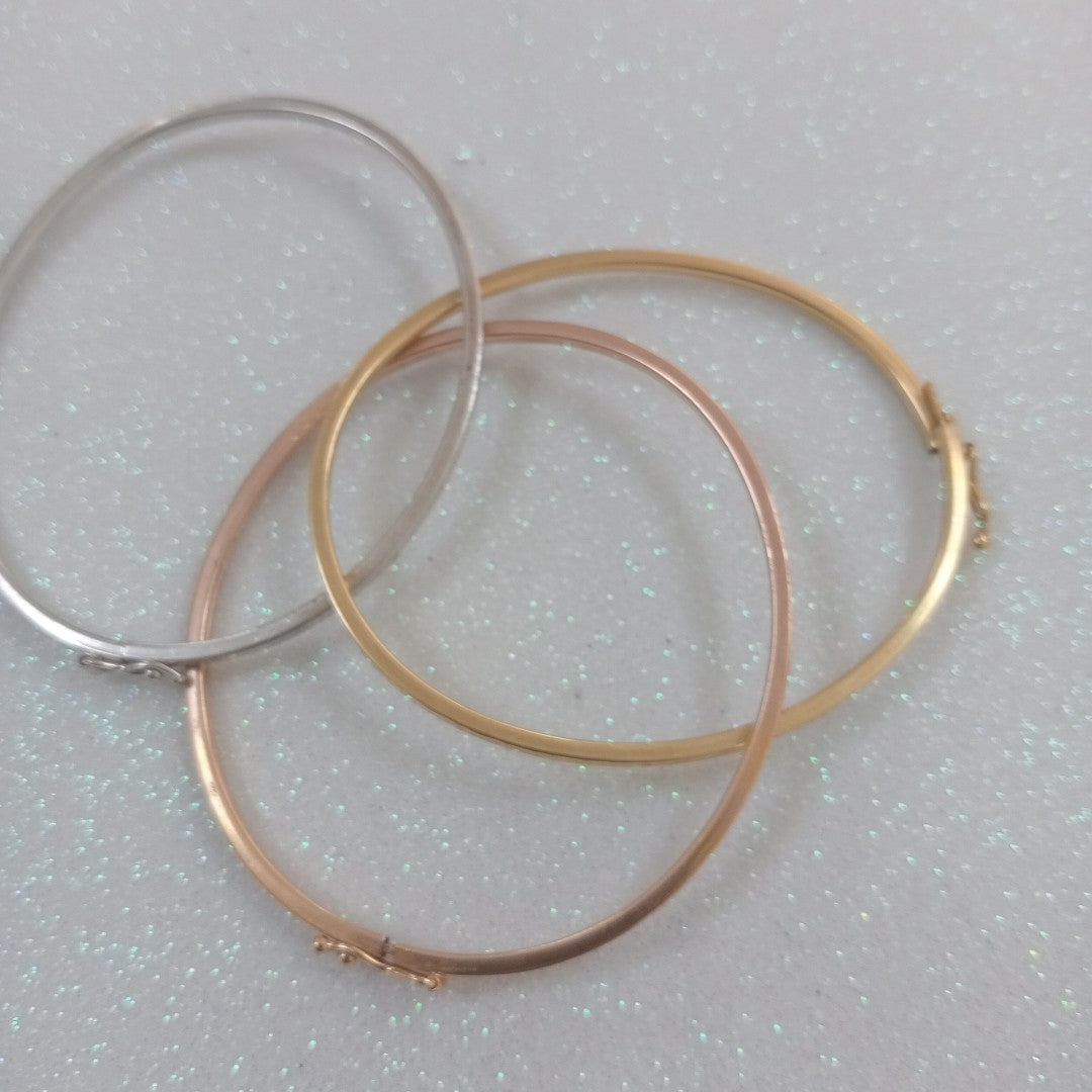 PULSERA RIGIDA ORO COMBINADO 14 K 8,80 GRMS (SEMINUEVO)