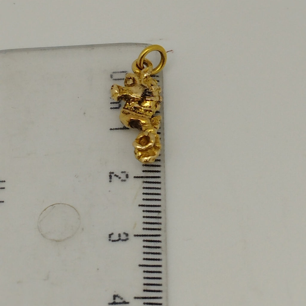 DIJE. ORO. 14 K 2.3 GRMS (SEMINUEVO)