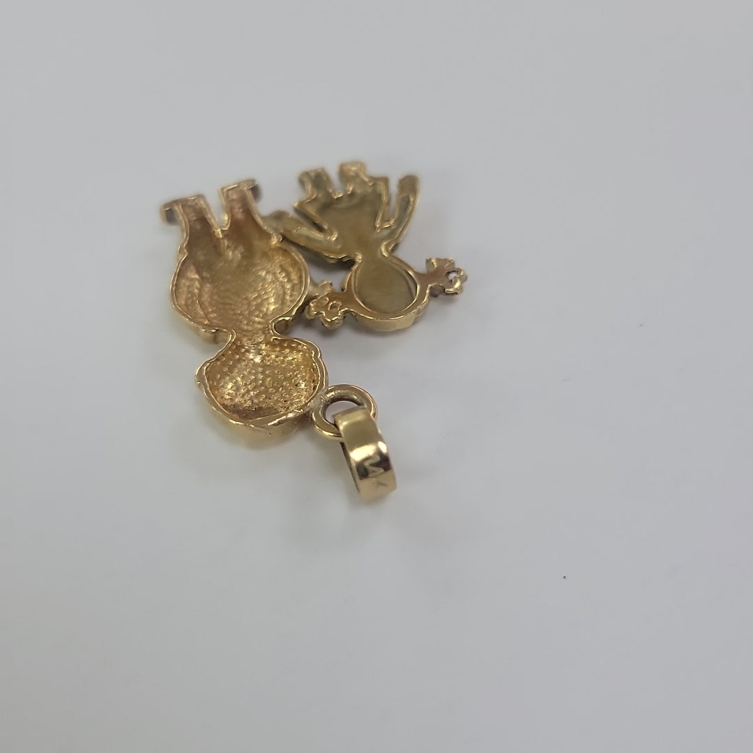 DIJE. ORO. 14 K 4.9 GRMS (SEMINUEVO)