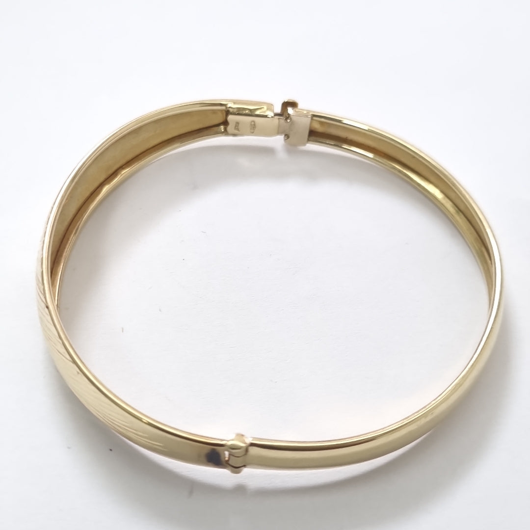 PULSERA RIGIDA. ORO. 14 K 8.6 GRMS (SEMINUEVO)