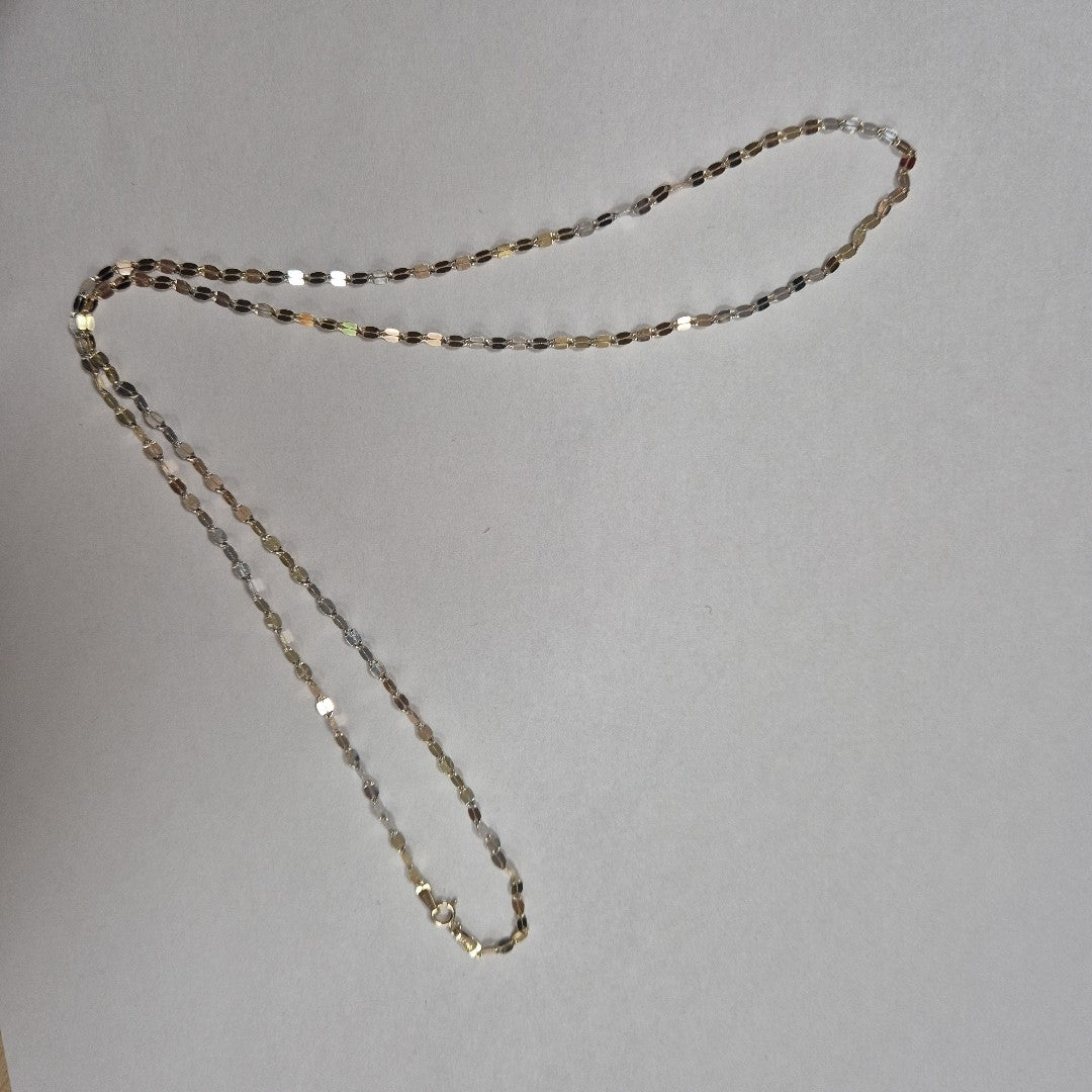 CADENA. ORO COMBINADO. 14 K 2.2 GRMS (SEMINUEVO)