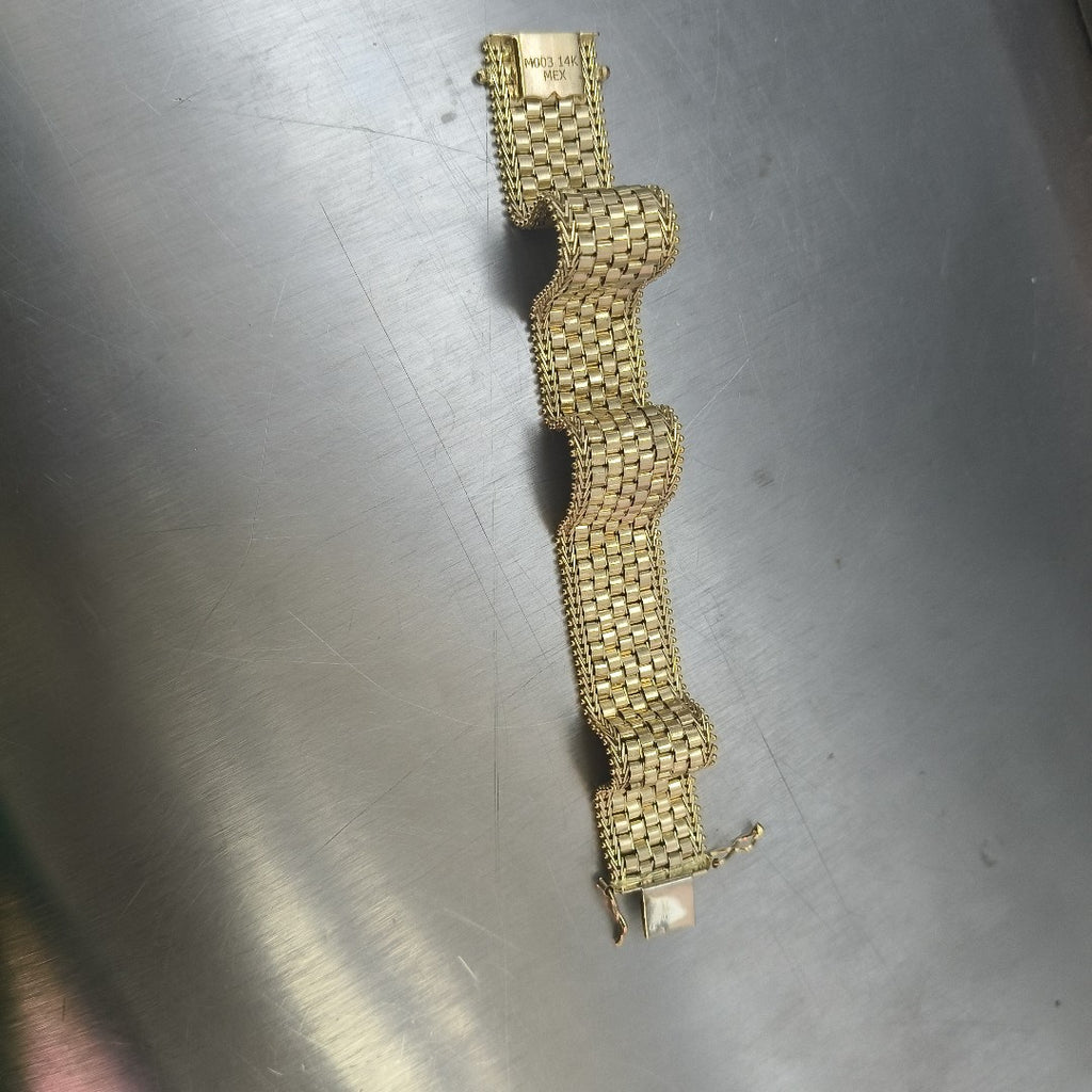 PULSERA. ORO. 14 K 24.7 GRMS (SEMINUEVO)