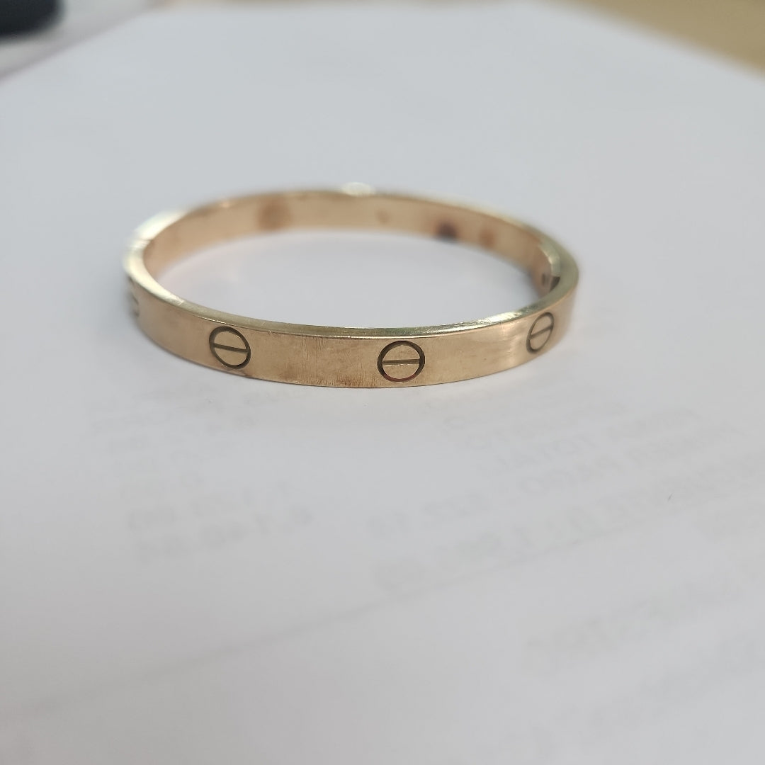 PULSERA RIGIDA. ORO. 14 K 19.6 GRMS (SEMINUEVO)