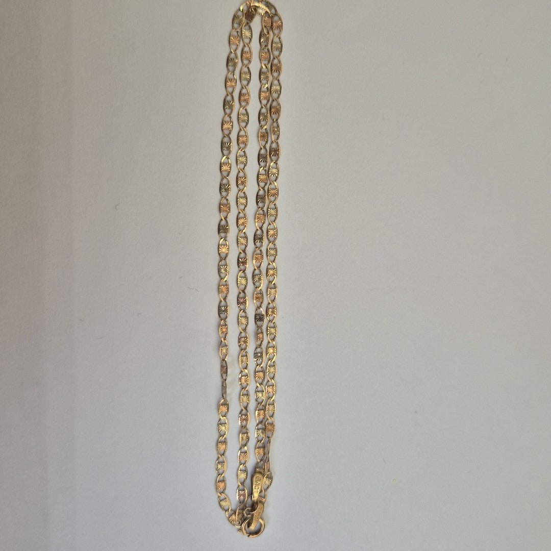 CADENA. ORO, ORO COMBINADO. 10 K 2.1 GRMS (SEMINUEVO)