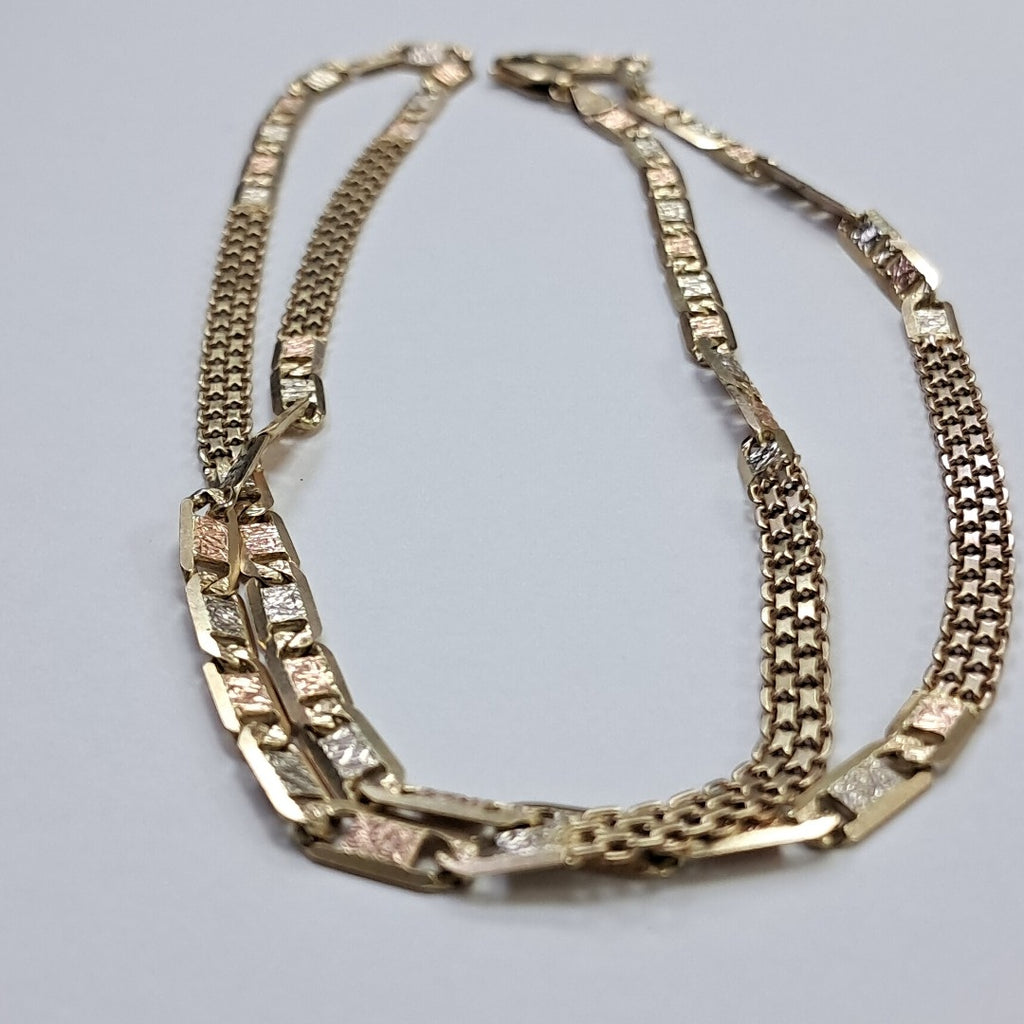 CADENA. ORO COMBINADO. 14 K 22.2 GRMS (SEMINUEVO)