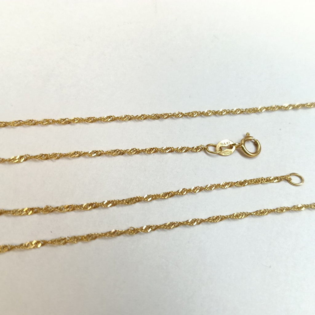 K1 1,40 GRMS 14 K ESPECIFICACIONES COMPLEMENTARIAS CADENA 14K 1/2 TORZAL (SEMINUEVO)