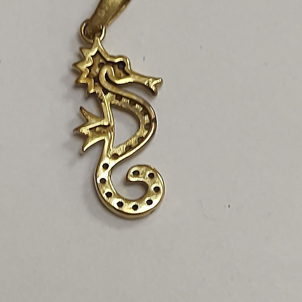 DIJE. ORO. 10 K 0.6 GRMS (SEMINUEVO)